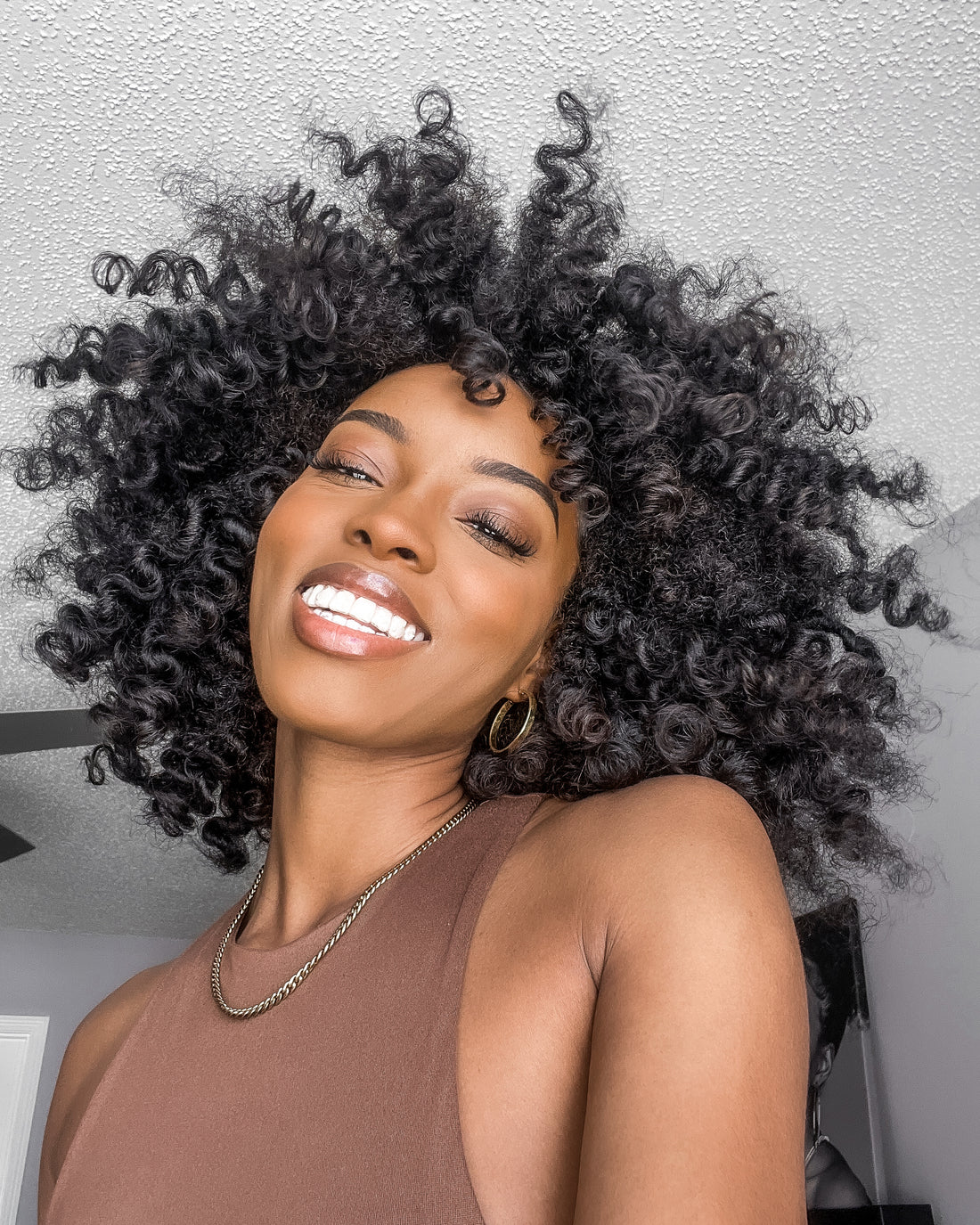 How To Master a Bantu Knot Out with Clip Ins