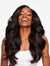 BLACK WOMAN WEARING HEAT FREE HAIR BLOWOUT WEFTED HAIR EXTENSIONS, FRONT